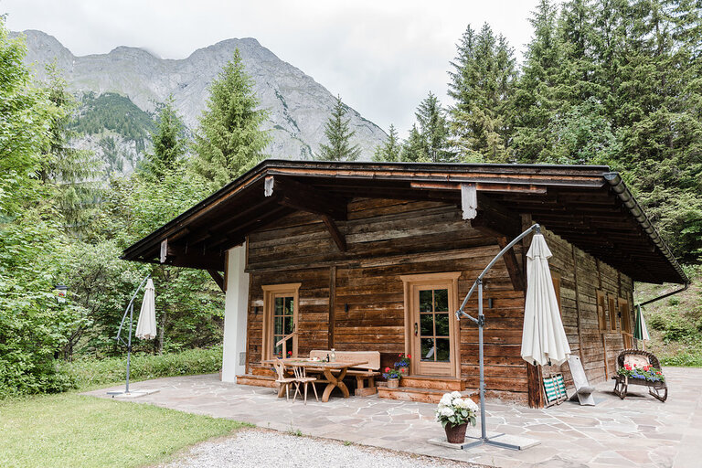 [Translate to English:] Alm Chalet